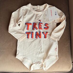 Tiny Cottons NWT!!! Cream Long Sleeve Baby Onesie with Orange and Blue Print